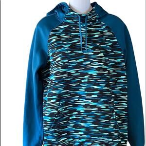 Nike Womens size medium Dri-fit hoodie in a dark turquoise print.